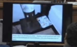 lamp on left side of bed - holster seen to the right of it