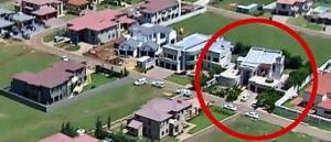 van der mewre blue house across street